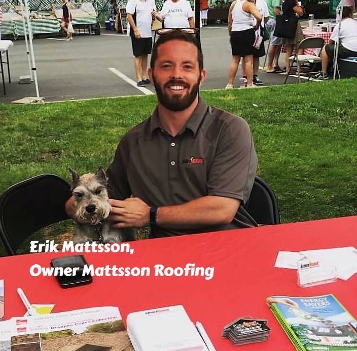 Erik Mattsson, owner of Mattsson Roofing, with his Giant Schnauzer Riva