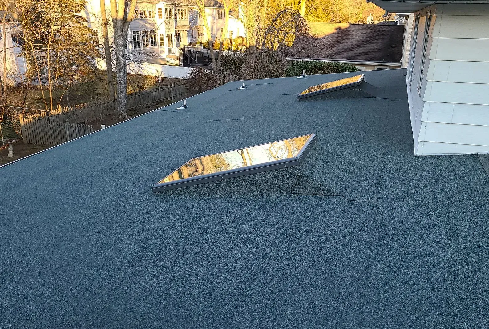 Gutter system installed along a roof edge