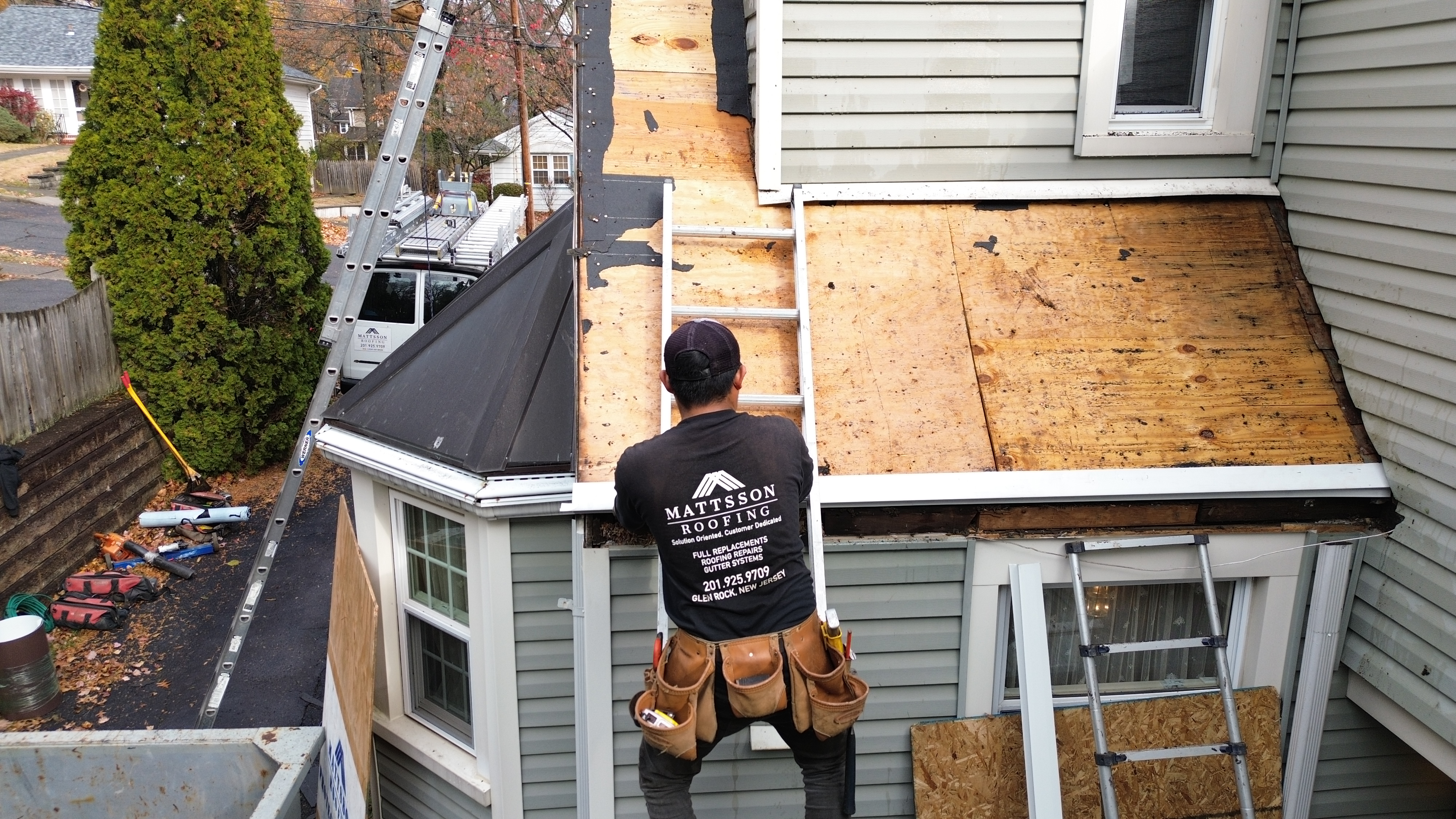 Roof repair work around a chimney