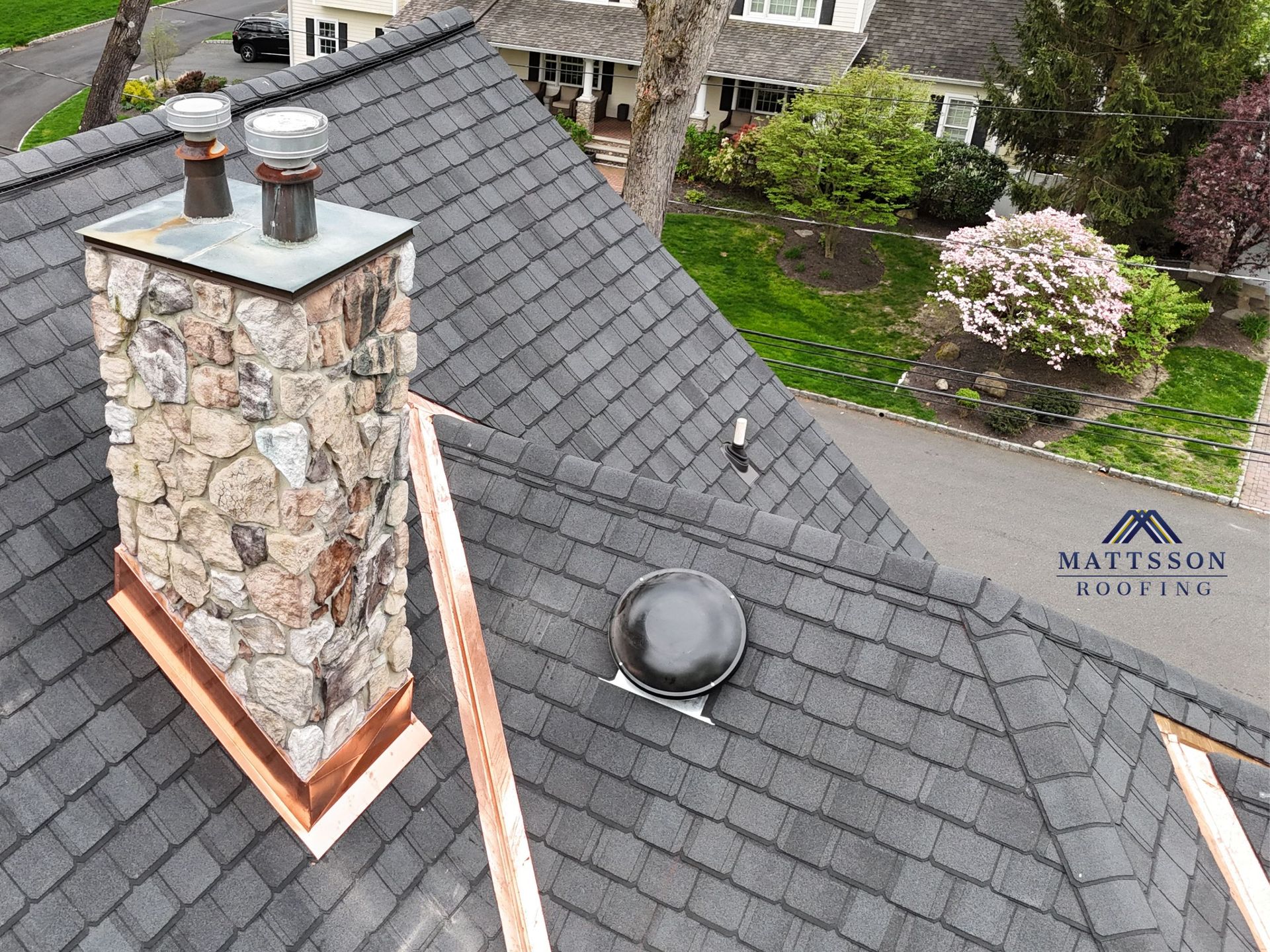 Standing-seam metal detailing and copper flashing